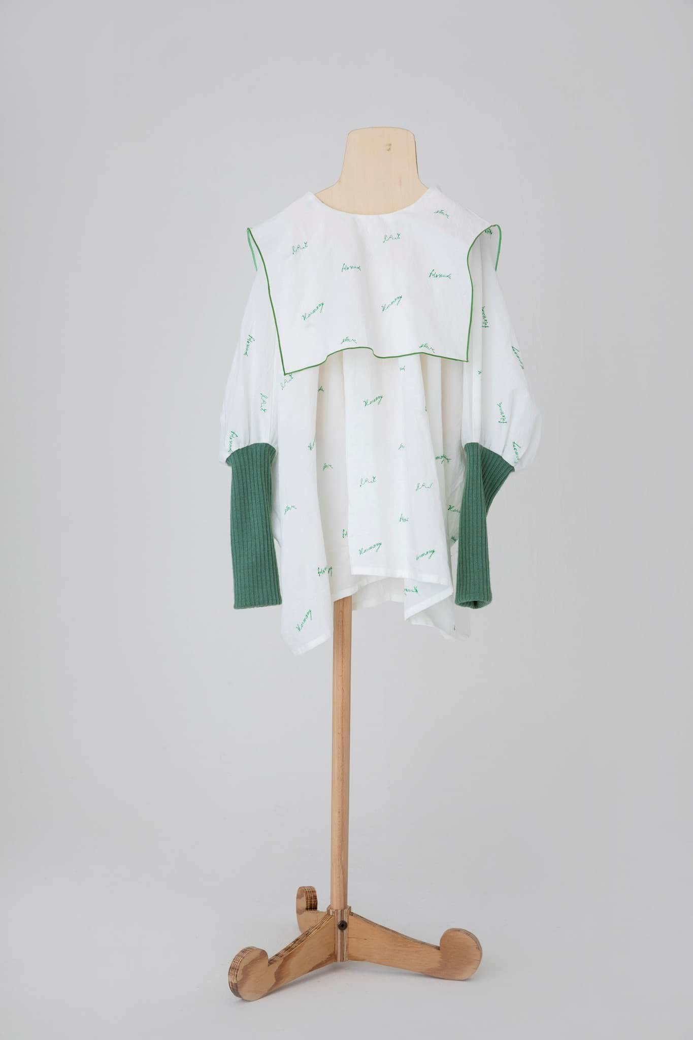 صورة white, green embroidery sailor top
